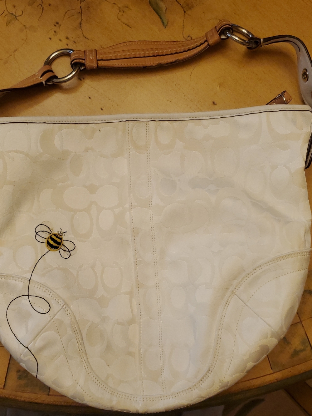 Coach Cream Shoulder Bag with Tan Leather Strap and Bee Motif